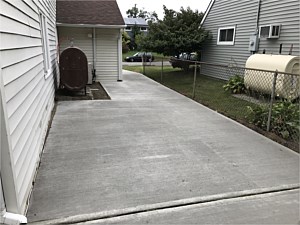 concrete side of house walkway walk way